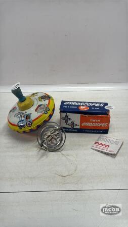 VINTAGE 5IN TIN SPINNER W/CIRCUS TRAIN THEME