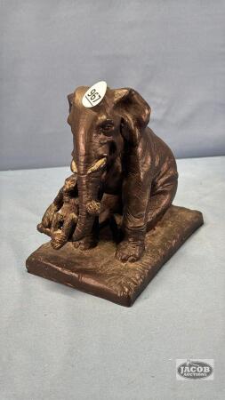 CAST IRON ELEPHANT WITH MONKEY