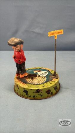 LITTLE TIN WIND UP FISHERMAN