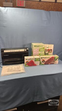 FOOD SAVER WITH QTY OF FOOD SAVER MATERIAL