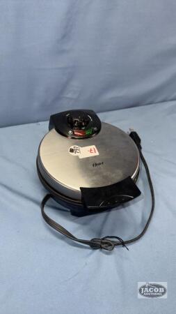 OSTER 7.5IN DIAMETER WAFFLE MAKER