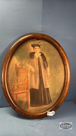 OAK OVAL FRAME 22IN TALL WITH DAMAGED PICTURE