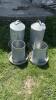 (4) CHICKEN FEEDERS. 2 WITH TOPS. ARE 22IN TALL. 2 OPEN TOPS ARE 14IN TALL