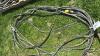 (3) CORDS WITH 230VOLT CORD ENDS. OUTER INSULATION ON ONE IS WORN THROUGH - 6
