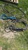 (3) CORDS WITH 230VOLT CORD ENDS. OUTER INSULATION ON ONE IS WORN THROUGH - 12
