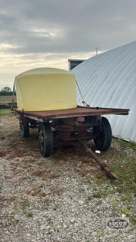 16FT X 7FT FLAT RACK WAGON WITH 1000 GALLON POLY TANK