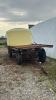 16FT X 7FT FLAT RACK WAGON WITH 1000 GALLON POLY TANK