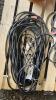 A LOT OF EXTENSION CORDS AND BOOSTER CABLES - 2