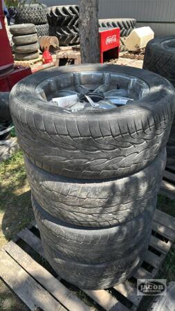 (4) TOYO TIRES ON 8 BOLT RIMS