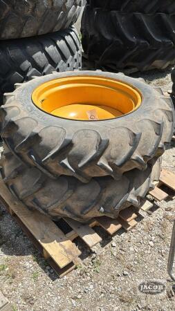 PAIR OF 11.2-24 TIRES ON 8 BOLT RIMS