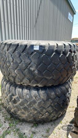 TWO UNMATCHED TIRES 30.5LR32