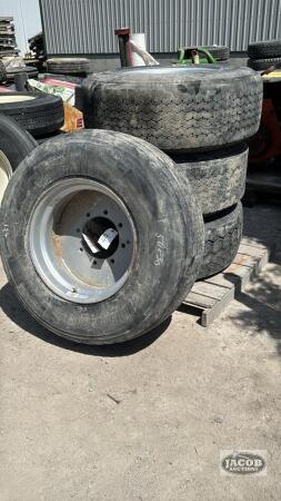 (4) UNMATCHED 385/65R22.5 TIRES ON 8 BOLT RIMS