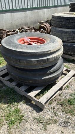 (2) GOODYEAR 11.00-16 TIRES ON 8 BOLT RIMS