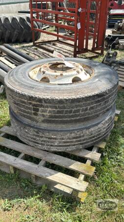 (2) UNMATCHED 11R22.5 TIRES ON 10 BOLT STEEL RIMS