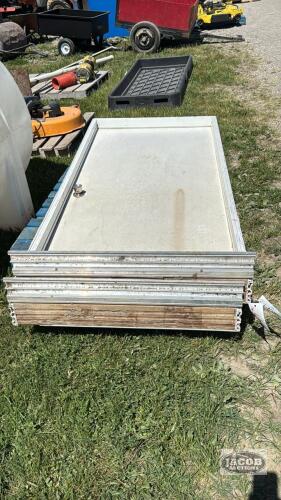 (2) PLASTIC COATED 3FT X 6FT 8IN MAN DOORS