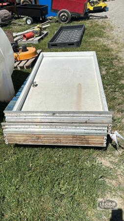 (2) PLASTIC COATED 3FT X 6FT 8IN MAN DOORS