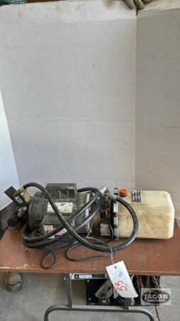 ELECTRIC MOTOR WITH PUMP RESERVOIR