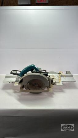MAKITA SKILL SAW WITH BLACK AND DECKER MITER MATE