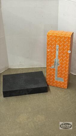 ADJUSTABLE HIGHT GUAGE ON A GRANITE SLAB