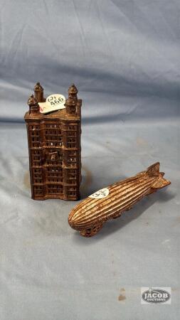 (2) CAST IRON COIN BANKS
