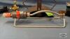 (3) LAWN SPRINKLERS WITH A GARDEN HOSE HANGER - 3