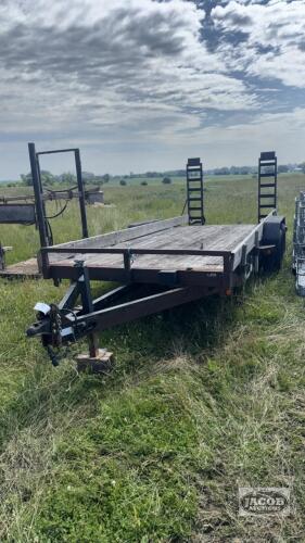 2014 15FT TANDEM AXLE TRAILER WITH A 3FT BEAVER TAIL AND RAMPS.