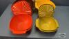 (4) NESTING TUPPERWARE BOWLS WITH LIDS - 4