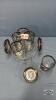 (4) 25TH ANN. GLASSES WITH COASTERS AND WIRE STAND - 4