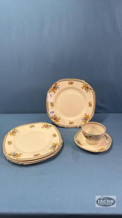 (4) 9IN PLATES AND (1) CUP AND SAUCER