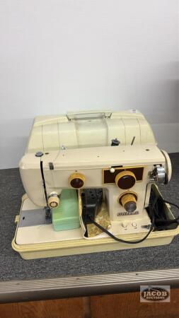 WHITE ELECTRIC SEWING MACHINE