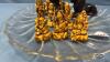 11IN GLASS PLATE WITH SELECTION OF ASIAN FIGURINES - 3