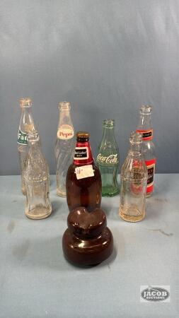 QUANTITY OF POP AND BEER BOTTLES WITH INSULATOR