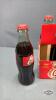 (24) COKA-COLA BOTTLES - 6