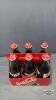 (24) COKA-COLA BOTTLES - 12