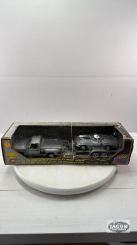 GMC TRUCK PULLING TRAILER WITH 1967 CORVETTE