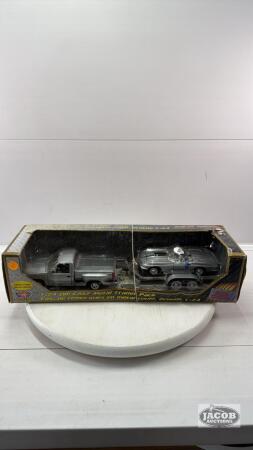 GMC TRUCK PULLING TRAILER WITH 1967 CORVETTE