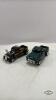 (2) TRUCKS