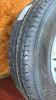 NEW GALLANT TRAILER TIRE ON RIM - 4