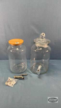 (2) UNMATCHED GLASS DRINK DISPENSERS