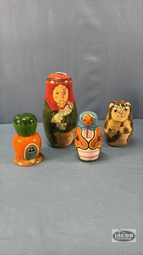 (3) NESTING DOLLS AND (1) EMPTY NESTING DOOL