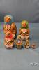 (3) NESTING DOLLS AND (1) EMPTY NESTING DOOL - 3