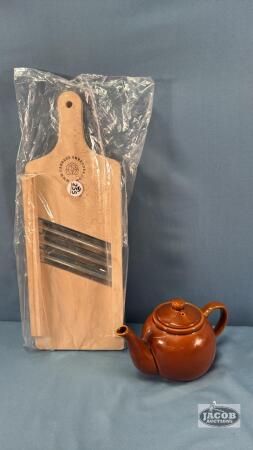 CABBAGE SHREDDER AND A 4IN TALL TEA POT