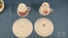 (8) TEA CUPS AND SAUCERS - 10