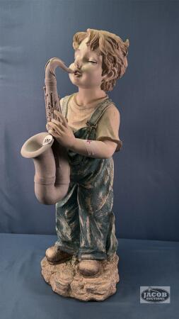 23.5IN TALL BOY WITH SAXOPHONE