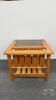 OAK END TABLE/MAGAZINE RACK WITH SMOKED GLASS TOP
