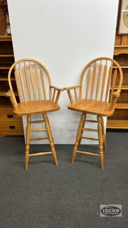 (2) OAK SWIVEL BAR STOOLS