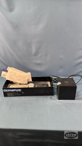 OLYMPUS CAMERA WITH A SONY RADIO ALARM CLOCK