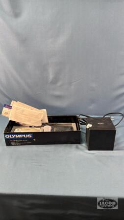 OLYMPUS CAMERA WITH A SONY RADIO ALARM CLOCK