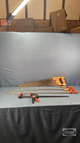 1 STANLEY HAND SAW AND 2 36IN SLIDING BAR CLAMPS