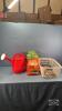 CLOTHES BASKET WITH GRASS SEED AND SPRINKLING CAN